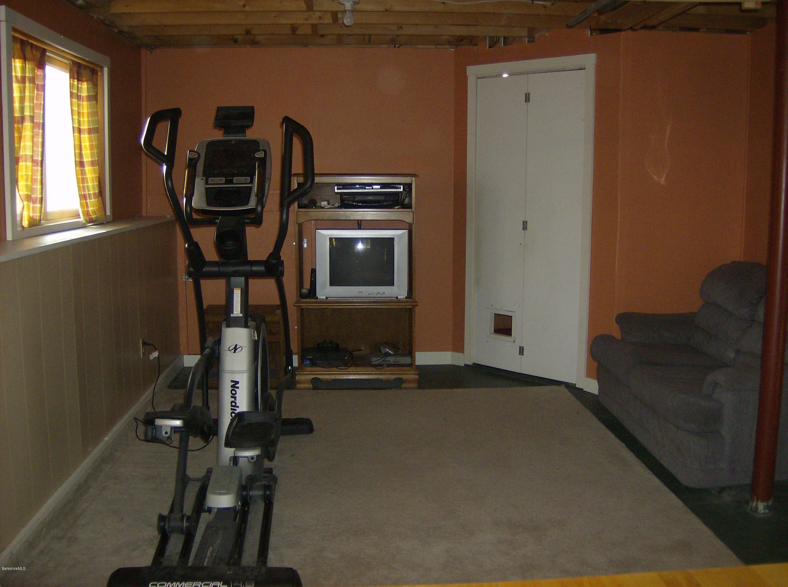125 Middlefield Road Peru, MA 01235 - Photo 41 of 45 a view of a room with gym equipment