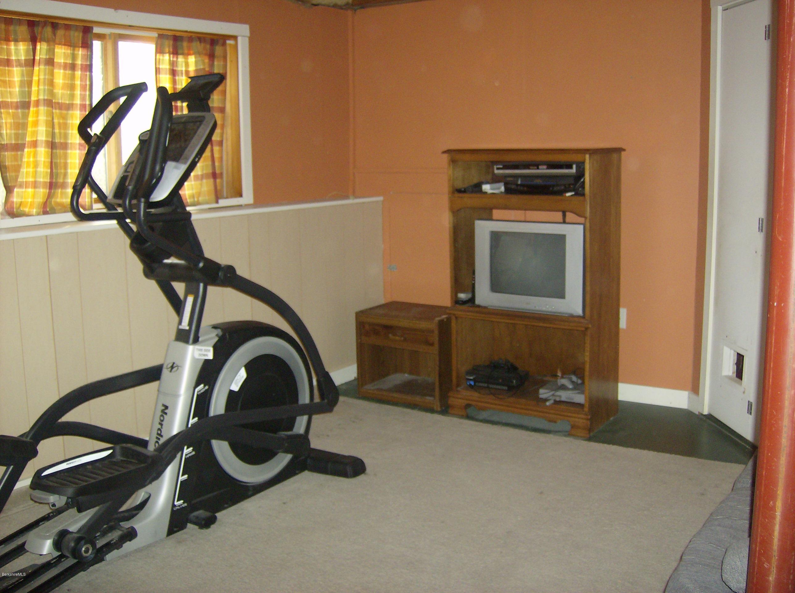 125 Middlefield Road Peru, MA 01235 - Photo 42 of 45 a room with gym equipment