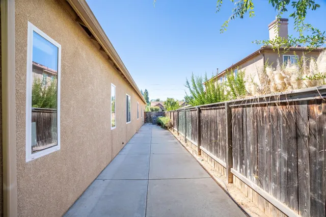 a view of balcony with wooden floor