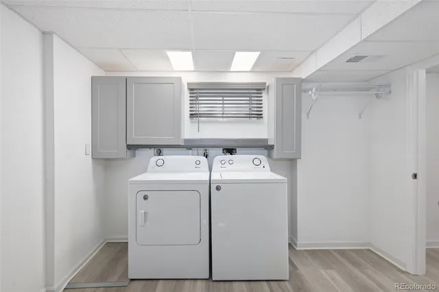 a view of room with window and wooden floor