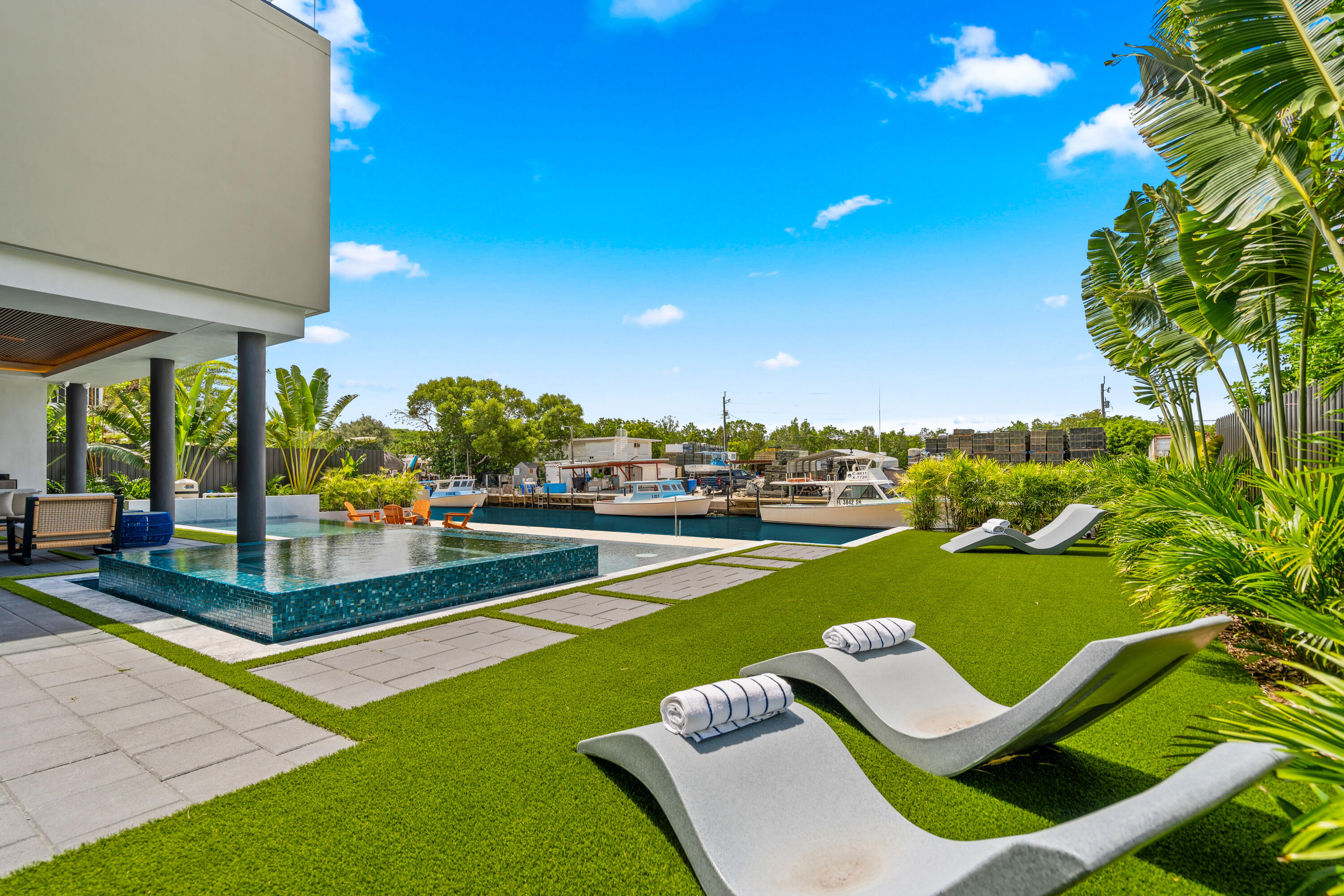 16 South Exuma Road Key Largo, FL 33037 - Photo 9 of 74 a view of a patio with swimming pool