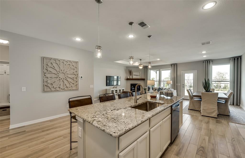 449 Avian Way Godley, TX 76044 - Photo 4 of 20 *Model Representation - Large island overlooking gathering room and dining areas