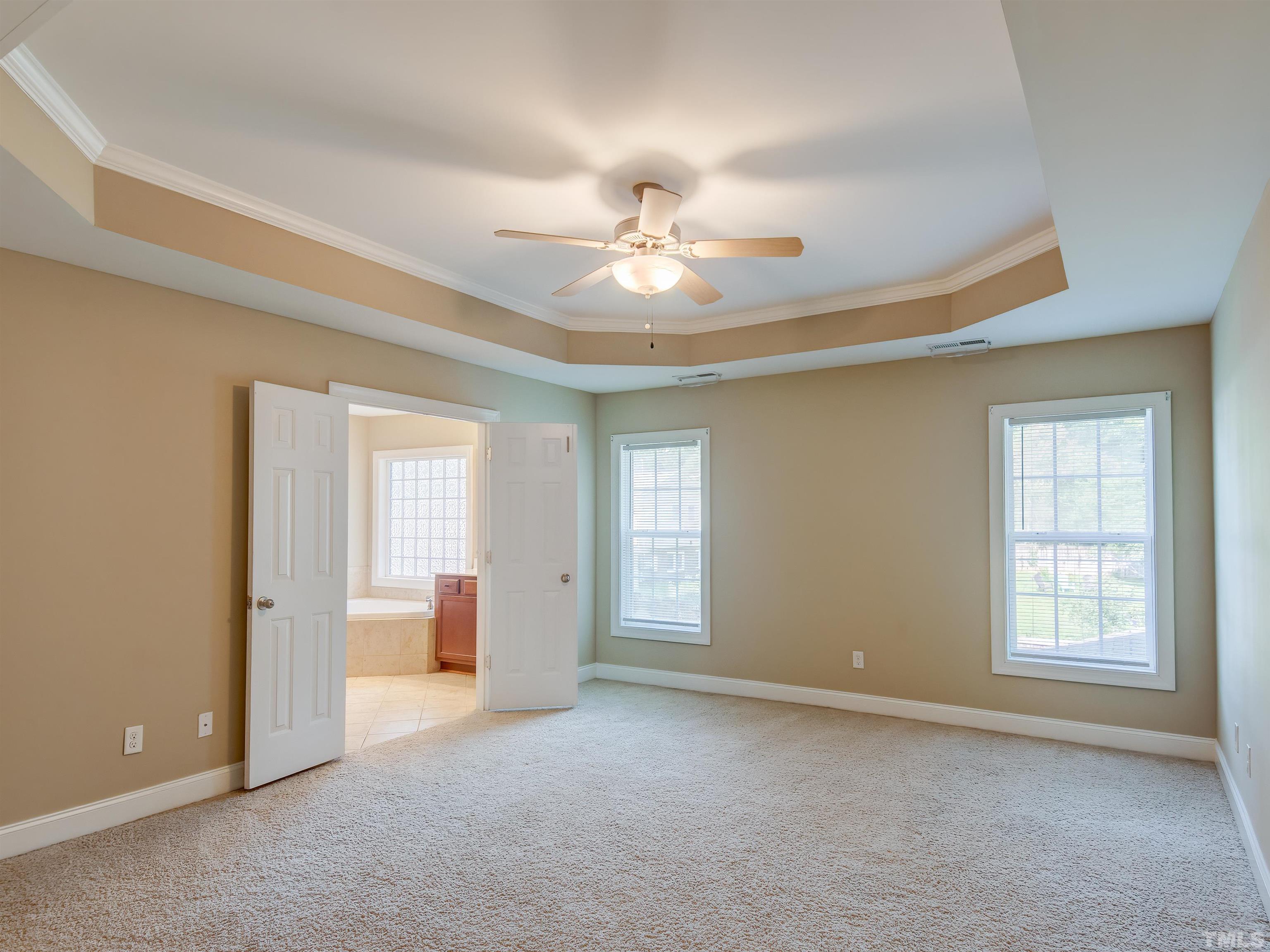 1104 Kingston Ridge Road Cary, NC 27511 - Photo 17 of 26 a view of an empty room with a window
