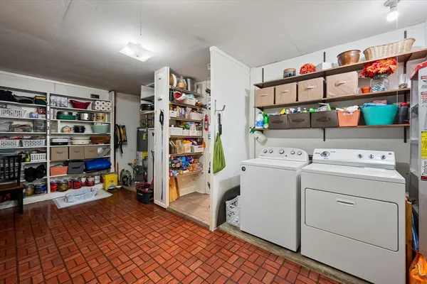 a storage room with washer and dryer