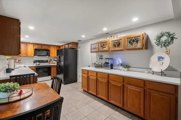 a kitchen with granite countertop lots of counter top space