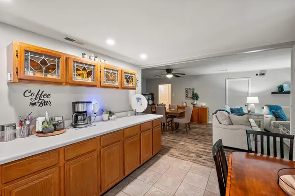 a very nice looking living room with a large window