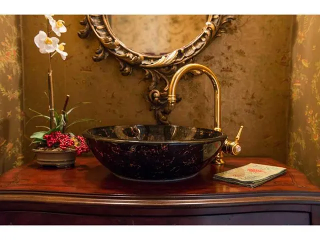a view of a patio with table and chairs potted plants with wooden floor