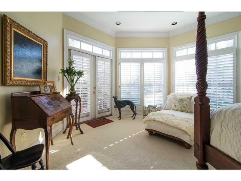 40 Dover Cliff Way Alpharetta, GA 30022 - Photo 10 of 24 a bedroom with a bed and large windows