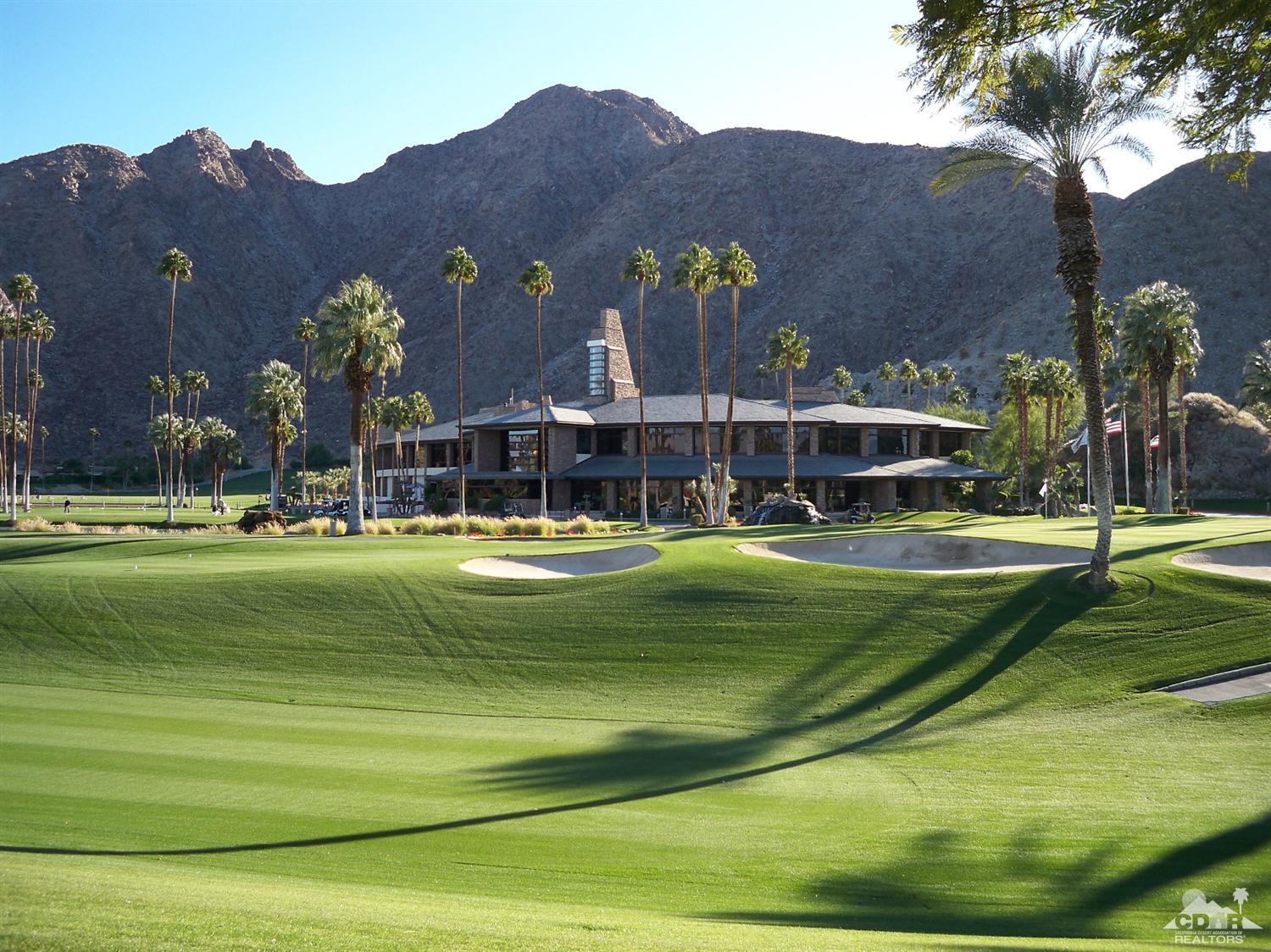 46330 Dove Road Indian Wells, CA 92210 - Photo 24 of 25 a view of a green field with a building
