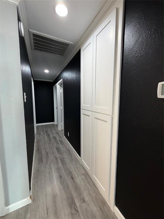 2038 Rose Hill Road Carrollton, TX 75007 - Photo 18 of 35 a view of hallway with wooden floor