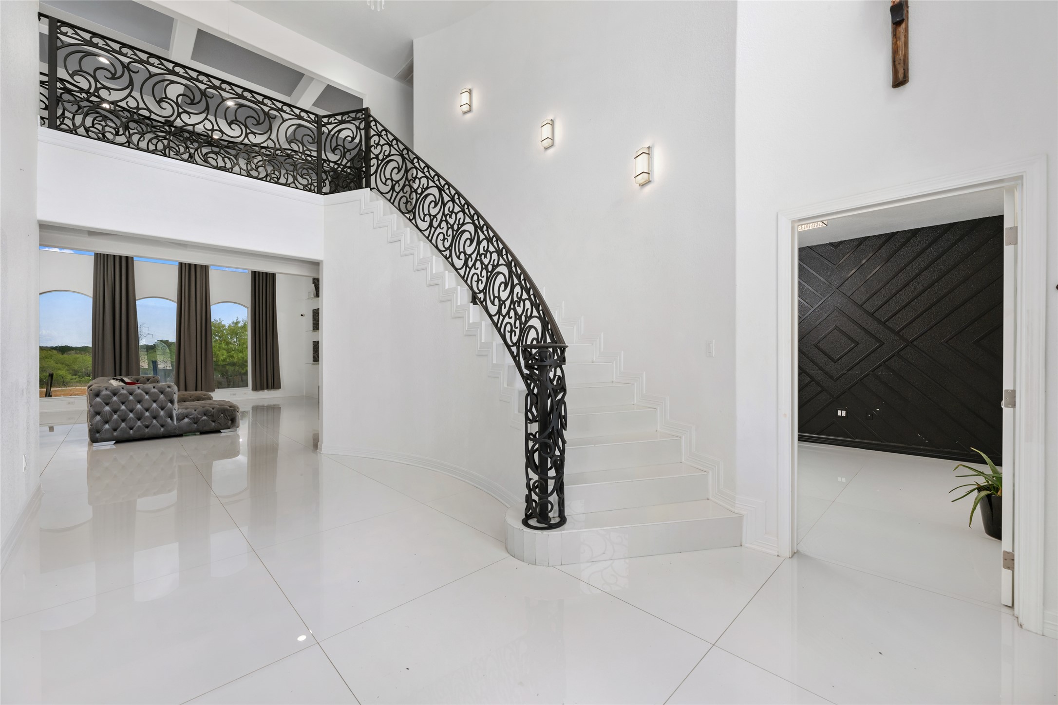 507 Rawhide Road Seguin, TX 78155 - Photo 7 of 40 Stairway with a high ceiling and tile patterned floors