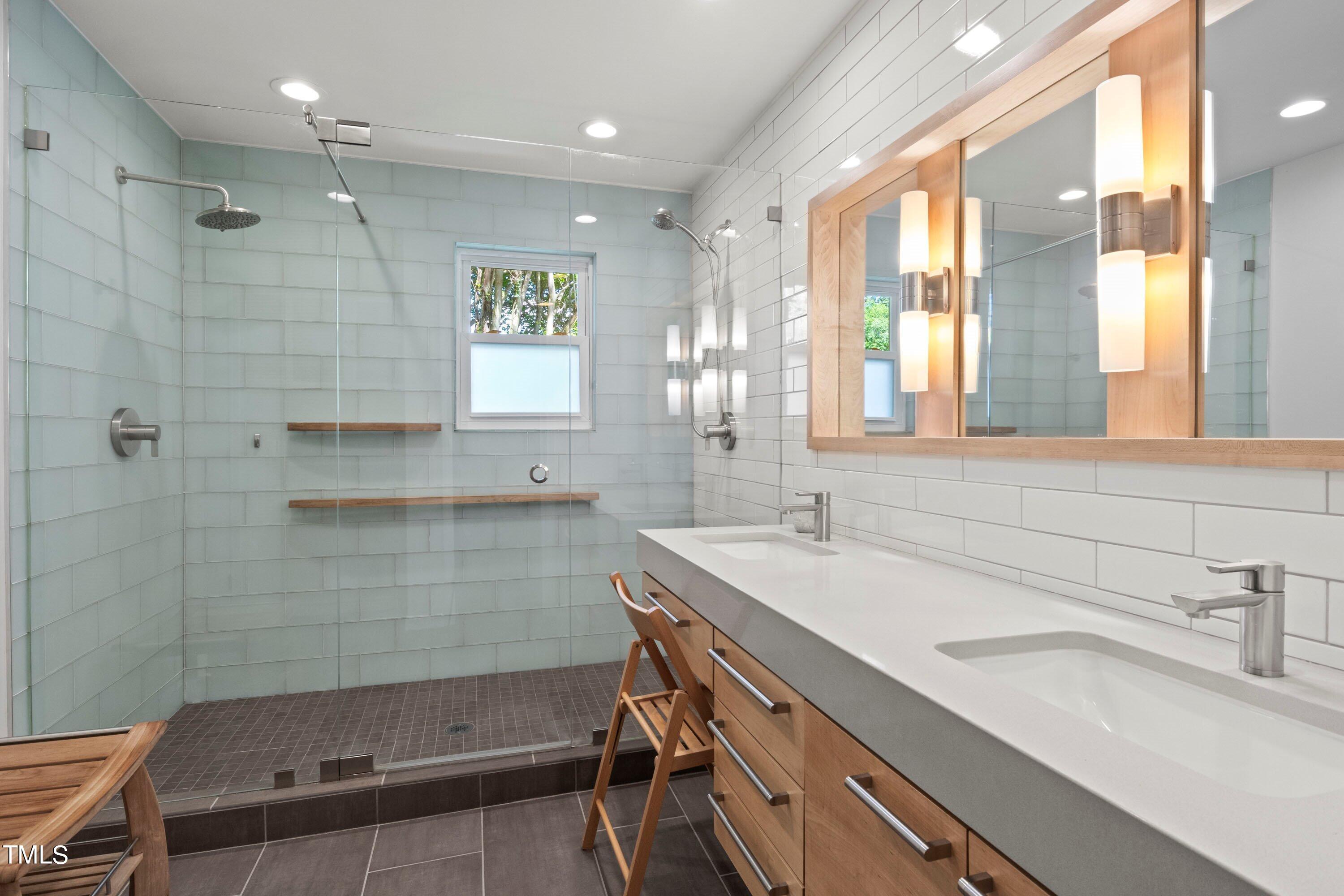 2762 Rue Sans Famille Raleigh, NC 27607 - Photo 23 of 35 a bathroom with a sink and a bathtub