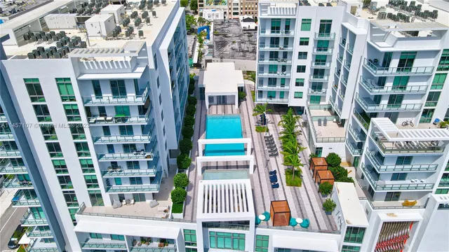 a bedroom with a bed and a night stand