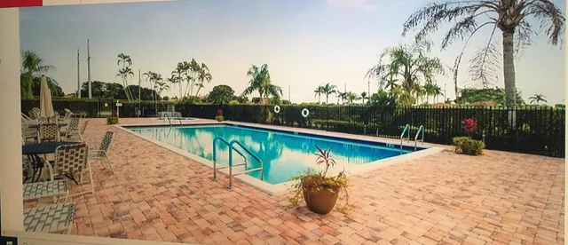 an aerial view of a houses with outdoor space