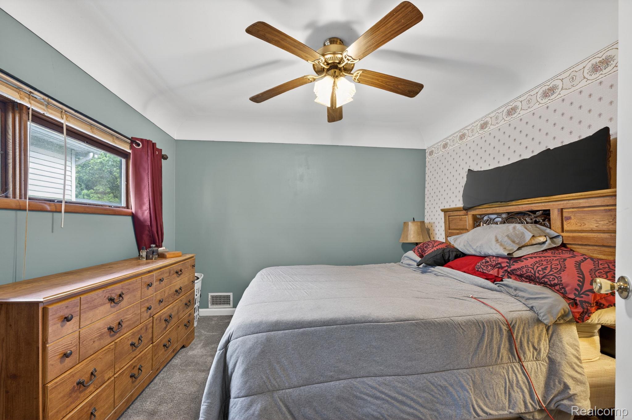304 West Ridge Street Owosso, MI 48867 - Photo 14 of 45 Bedroom featuring carpet floors and ceiling fan