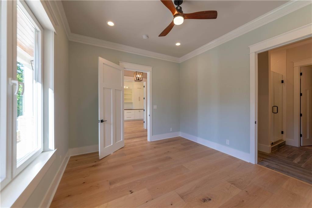 1303 North Druid Hills Road Northeast Atlanta, GA 30319 - Photo 15 of 39 an empty room with closet and a window