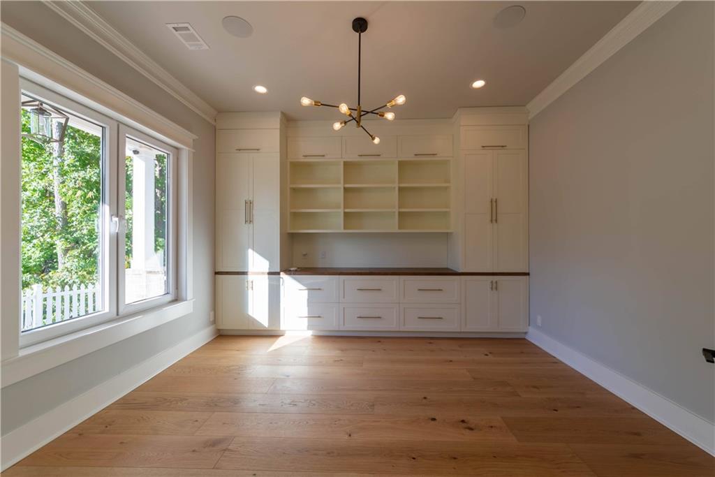 1303 North Druid Hills Road Northeast Atlanta, GA 30319 - Photo 18 of 39 a view of an empty room with a window