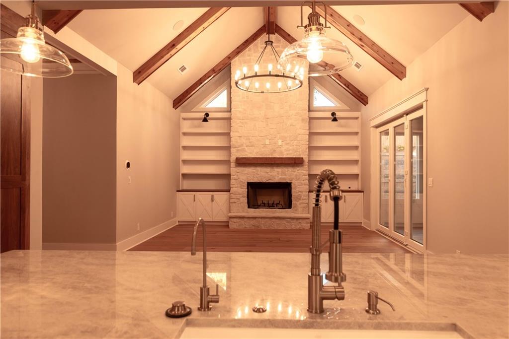 1303 North Druid Hills Road Northeast Atlanta, GA 30319 - Photo 9 of 39 a view of a livingroom with furniture and a fireplace