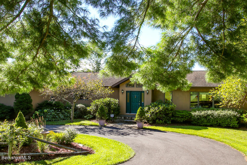 37 Kalliste Hill Great Barrington, MA 01230 - Photo 1 of 26 a view of a house with swimming pool and sitting area