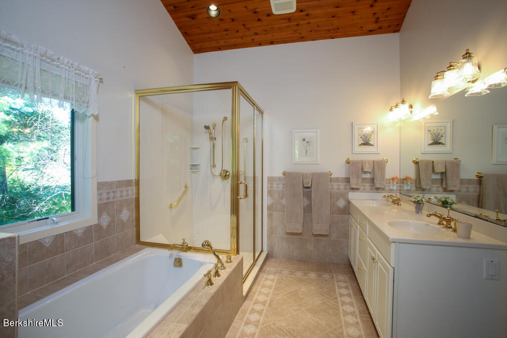 37 Kalliste Hill Great Barrington, MA 01230 - Photo 13 of 26 a spacious bathroom with a tub sink and shower