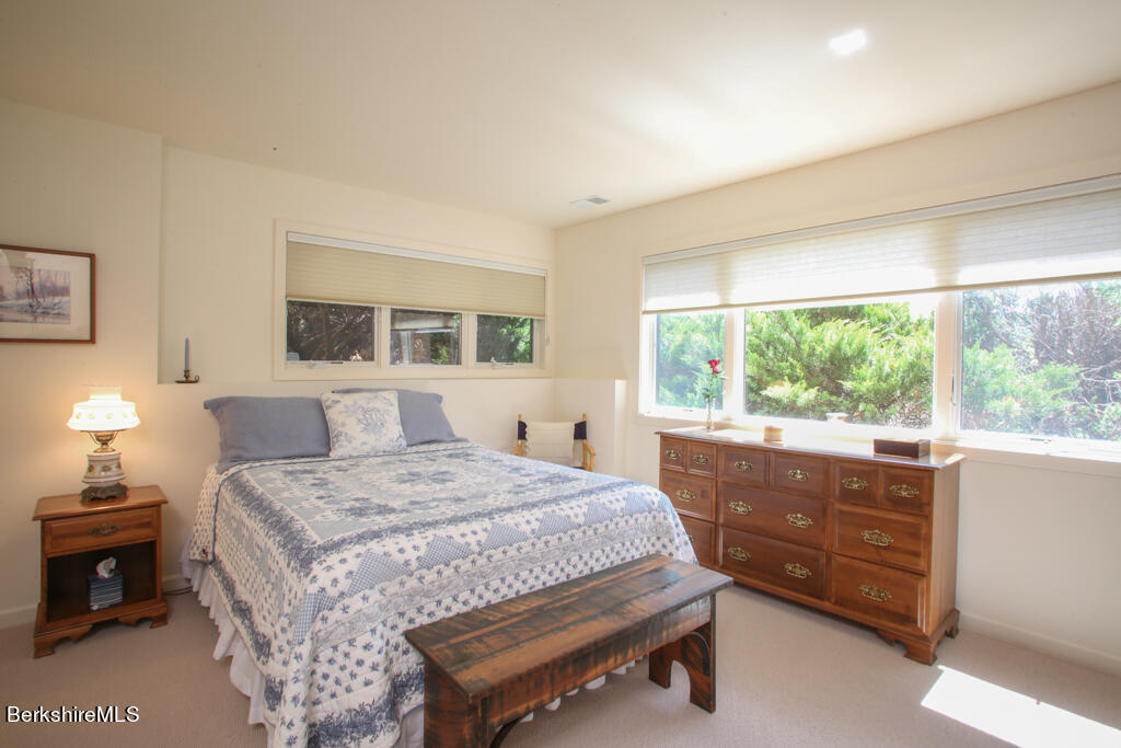 37 Kalliste Hill Great Barrington, MA 01230 - Photo 20 of 26 a room with a bed and a table in it