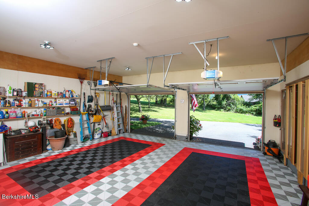 37 Kalliste Hill Great Barrington, MA 01230 - Photo 21 of 26 a room with lots of people and a large window