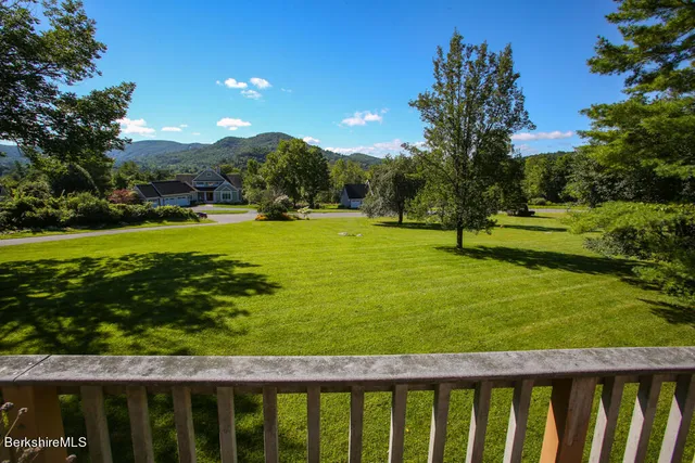 a view of a golf ground with a yard