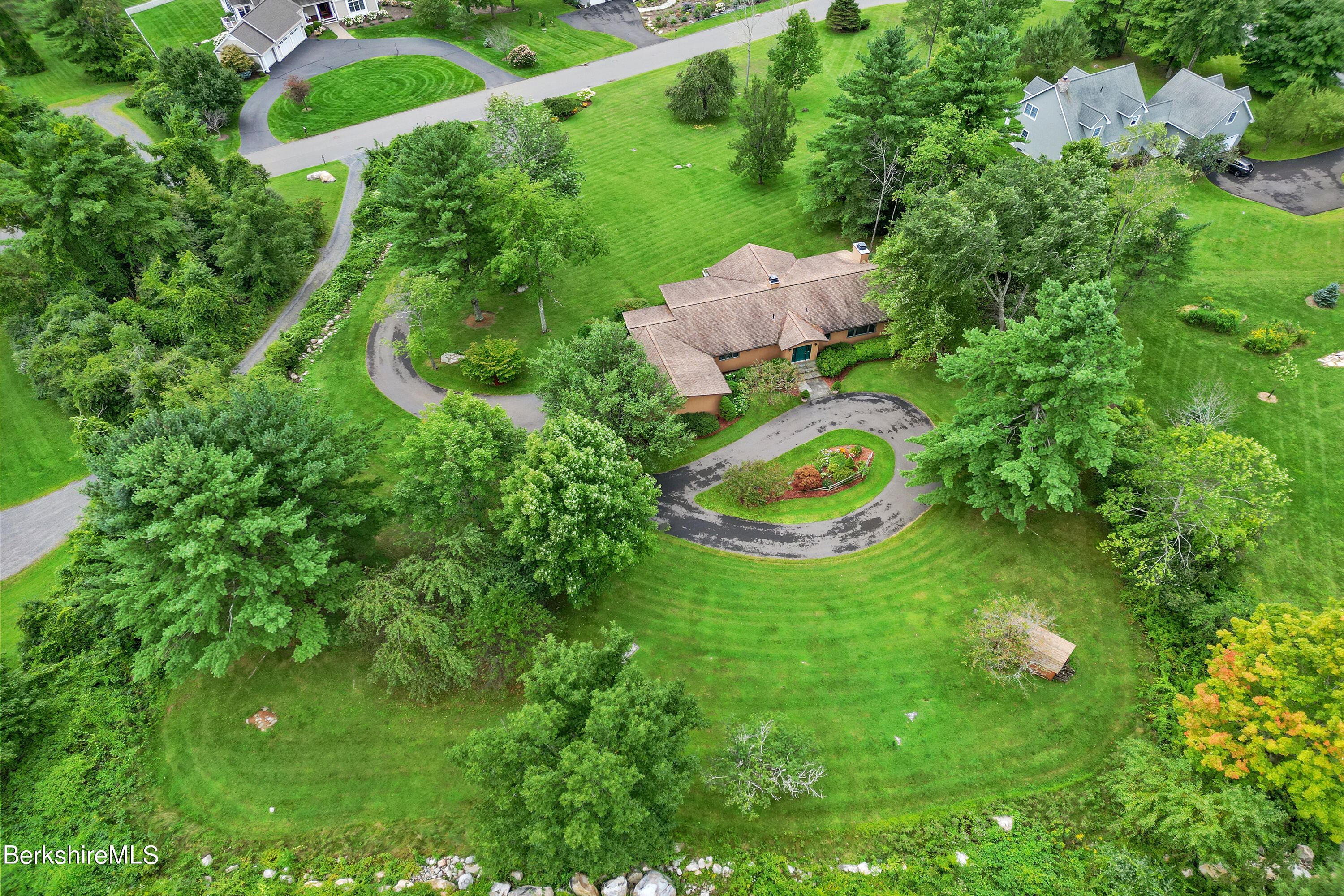 37 Kalliste Hill Great Barrington, MA 01230 - Photo 25 of 26 a backyard of a house with lots of green space