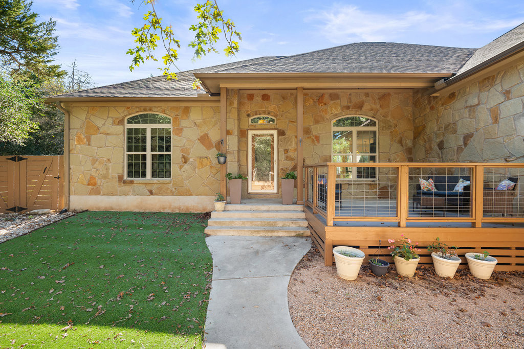 front view of a house with a garden