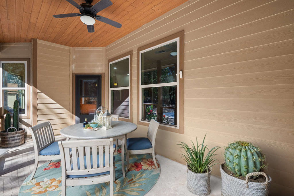 267 Corral Road Smithville, TX 78957 - Photo 30 of 40 a view of a house with porch and potted plants