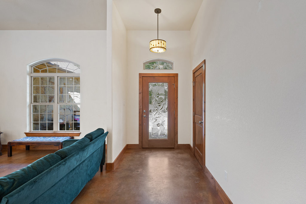 267 Corral Road Smithville, TX 78957 - Photo 8 of 40 a view of a hallway with windows