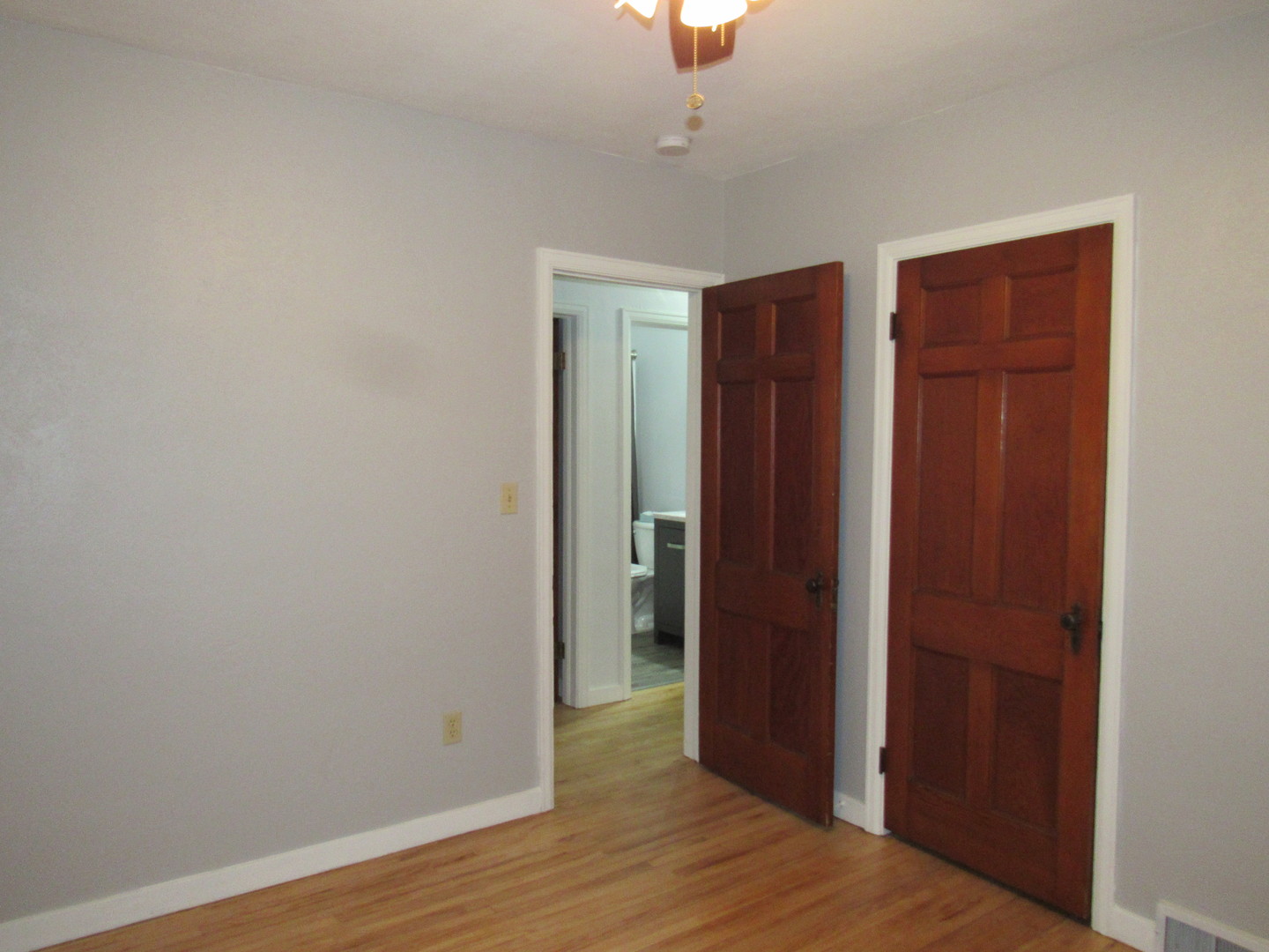 730 Lincoln Road Bettendorf, IA 52722 - Photo 11 of 13 an empty room with closet and wooden floor