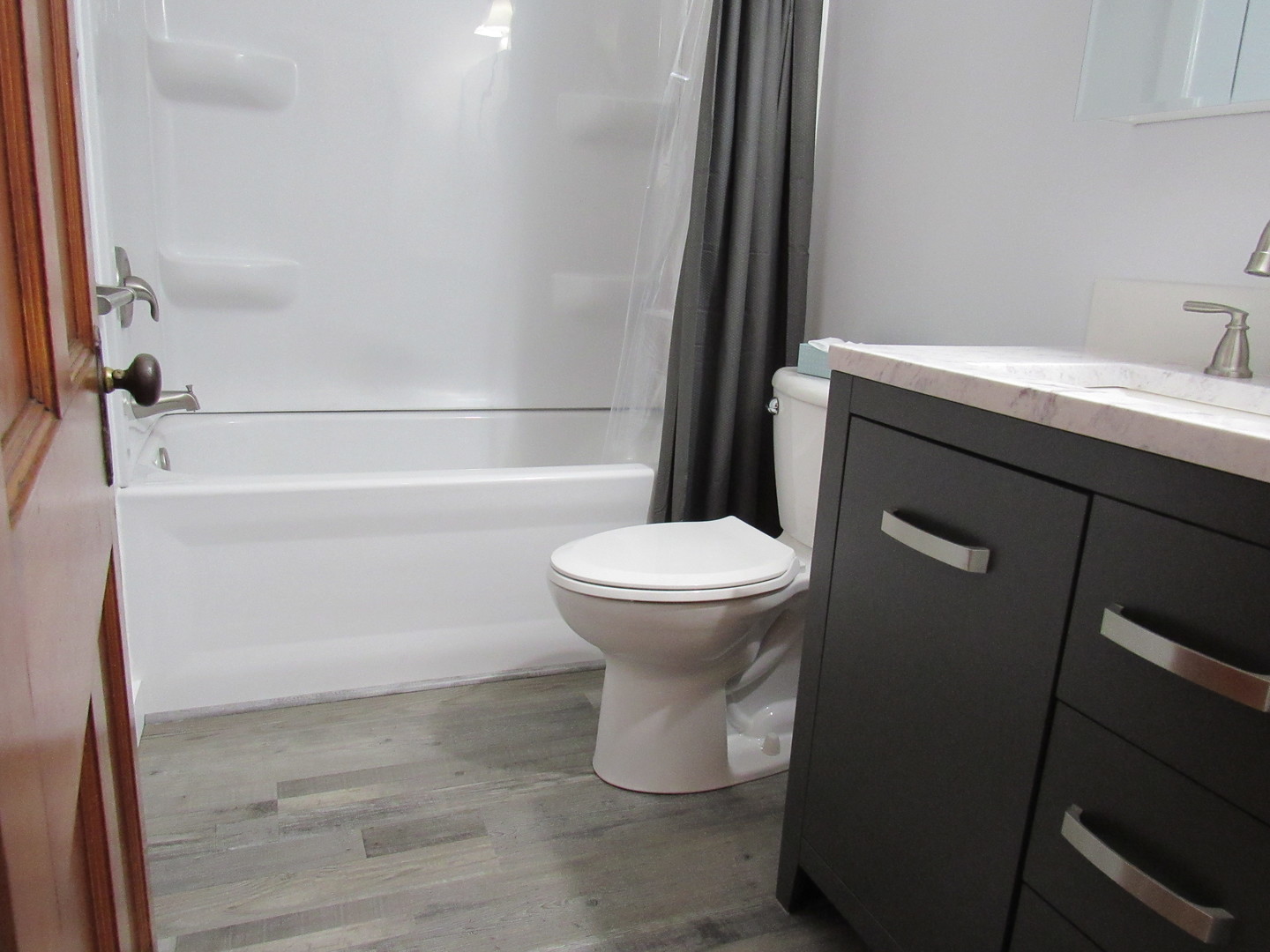 730 Lincoln Road Bettendorf, IA 52722 - Photo 7 of 13 a bathroom with a sink and a toilet