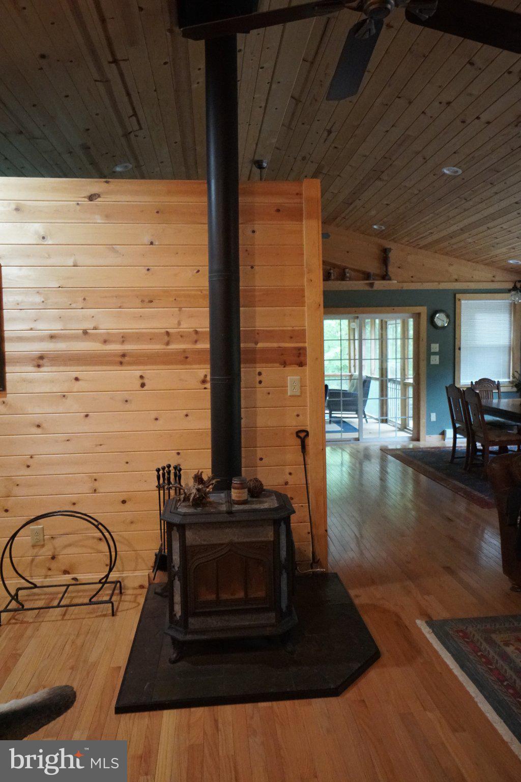 150 Sharp Ridge Lane Franklin, WV 26807 - Photo 23 of 69 Cozy warmth in a rustic retreat.