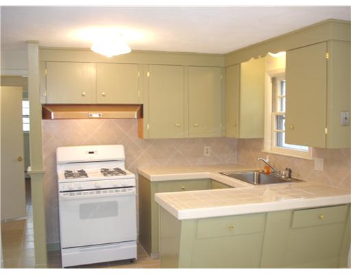 53 Audubon Road Warwick, RI 02888 - Photo 4 of 12 Kitchen. EAT IN KITCHEN HAS NEW GAS STOVE, REFRIGERATOR AND TILE