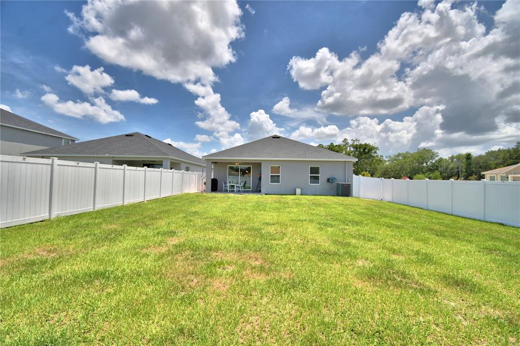 4340 Reding Way Lakeland, FL 33813 - Photo 4 of 63 a front view of a house with garden