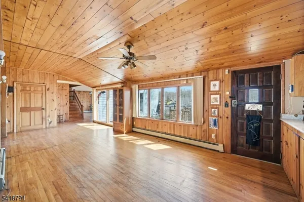 a view of livingroom with furniture wooden floor and window