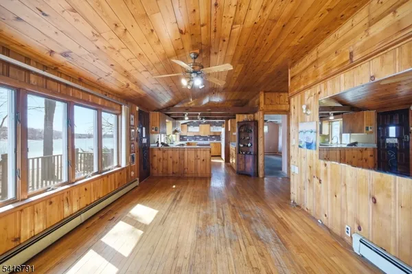 a view of a porch with wooden floor