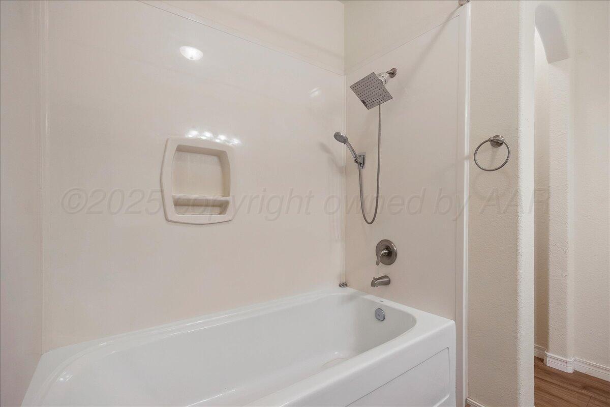1007 Shiraz Boulevard Amarillo, TX 79124 - Photo 13 of 21 a bathroom with a tub