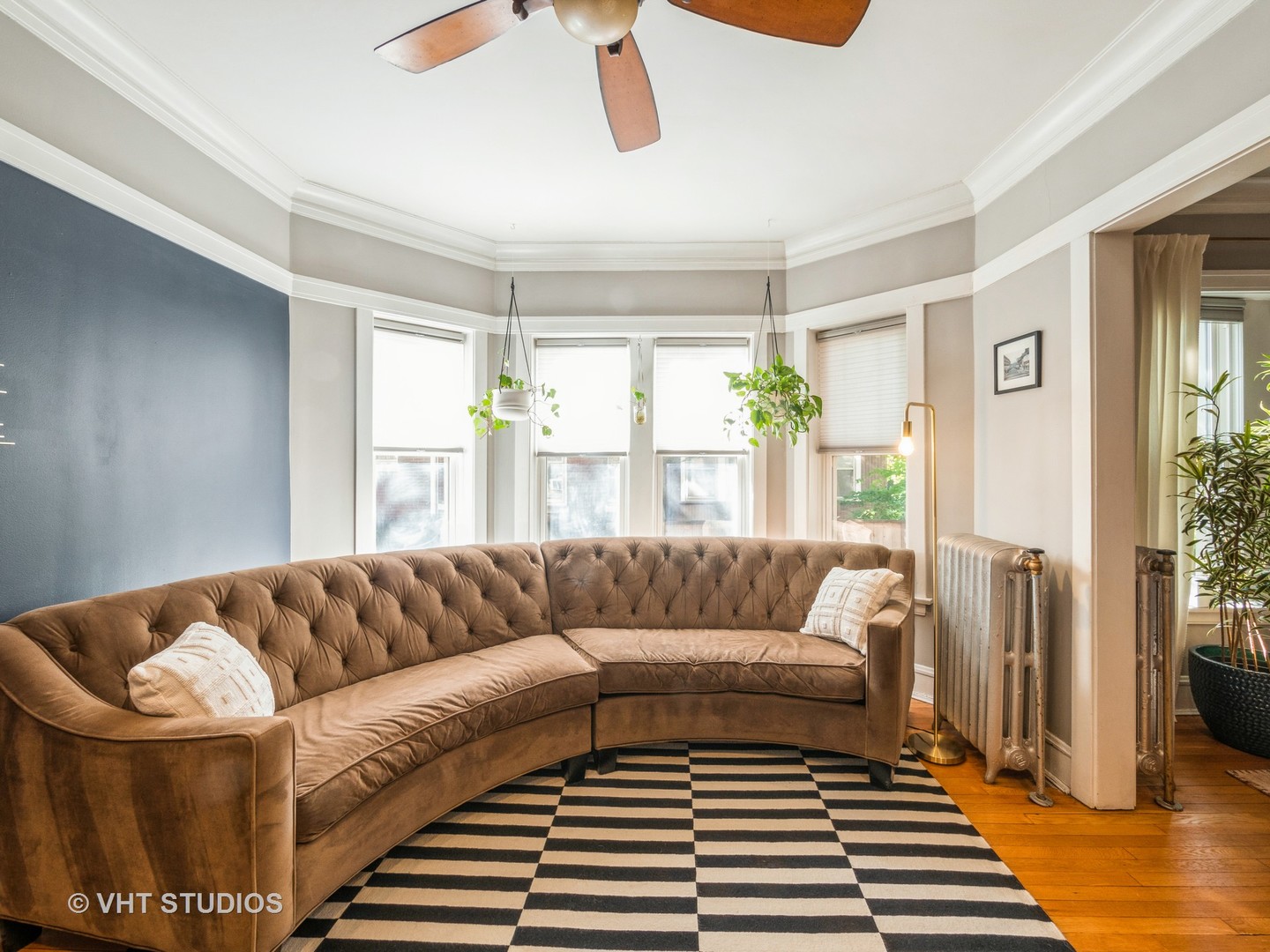 1440 West Summerdale Avenue, Unit 1 Chicago, IL 60640 - Photo 7 of 13 a living room with furniture and a rug