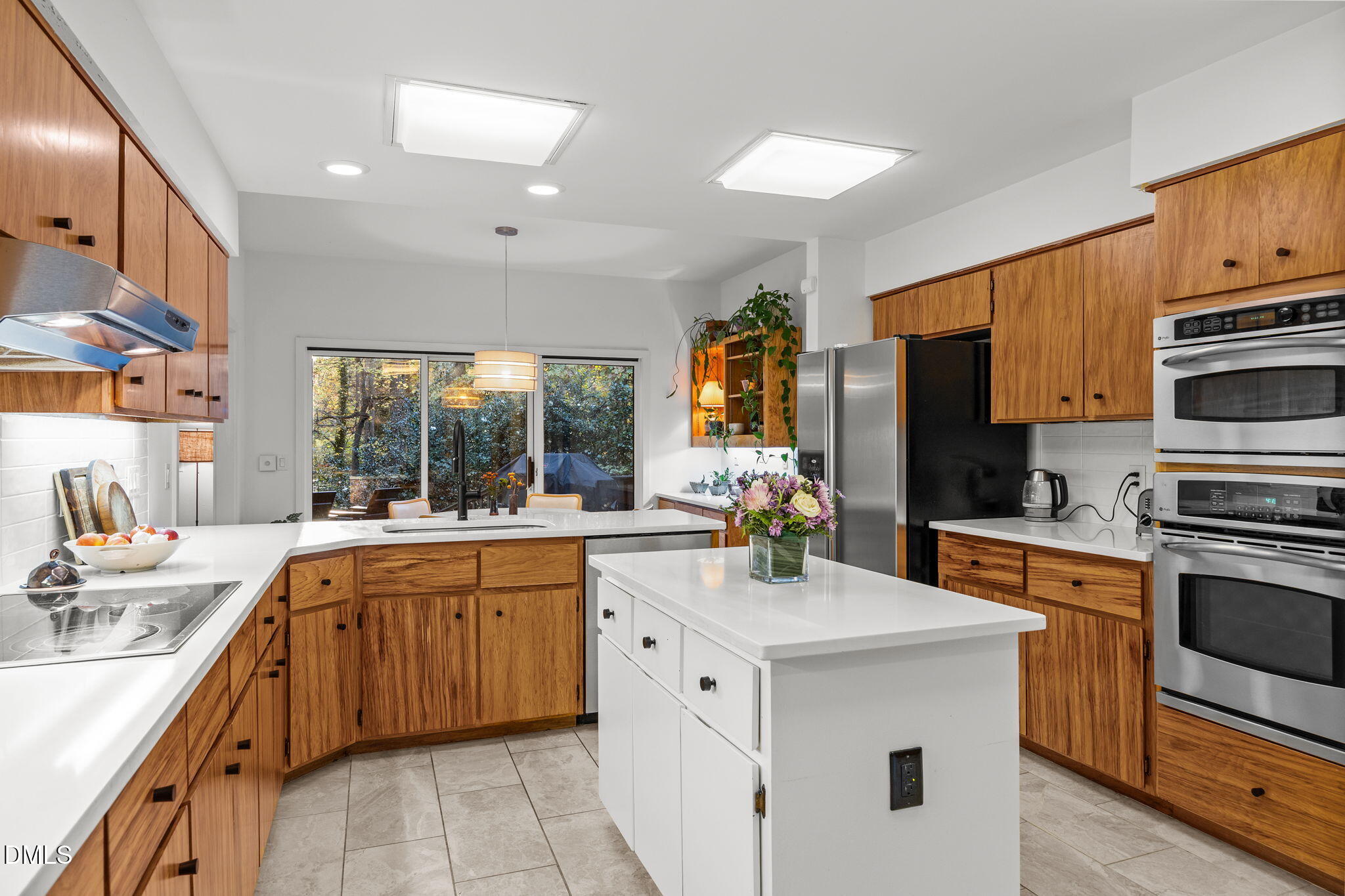8 Womble Circle Durham, NC 27705 - Photo 10 of 49 a kitchen with a sink stove and microwave