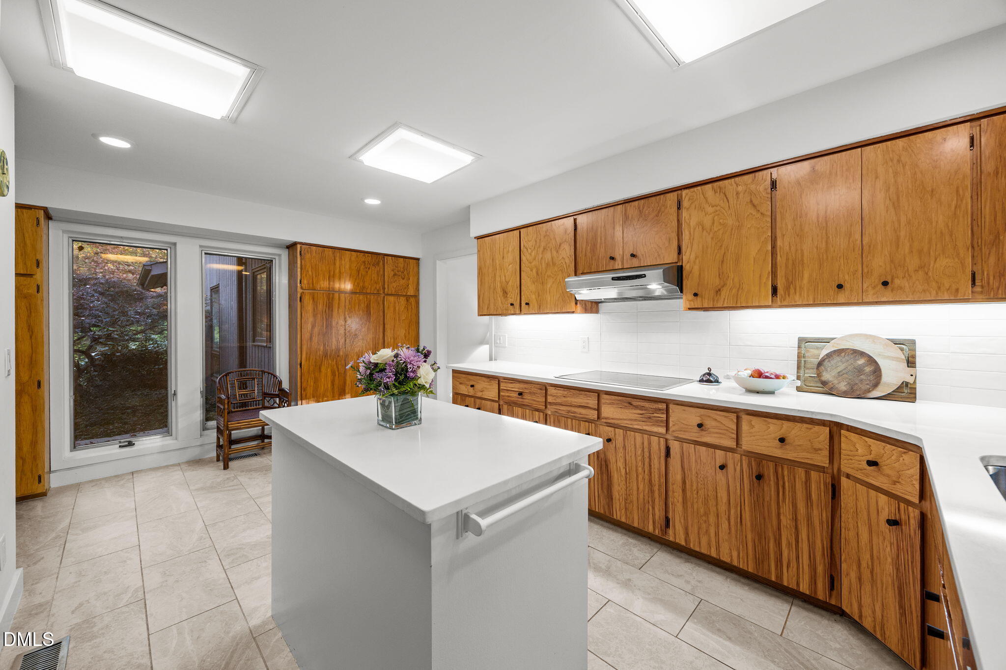 8 Womble Circle Durham, NC 27705 - Photo 11 of 49 a kitchen with a sink stove and cabinets