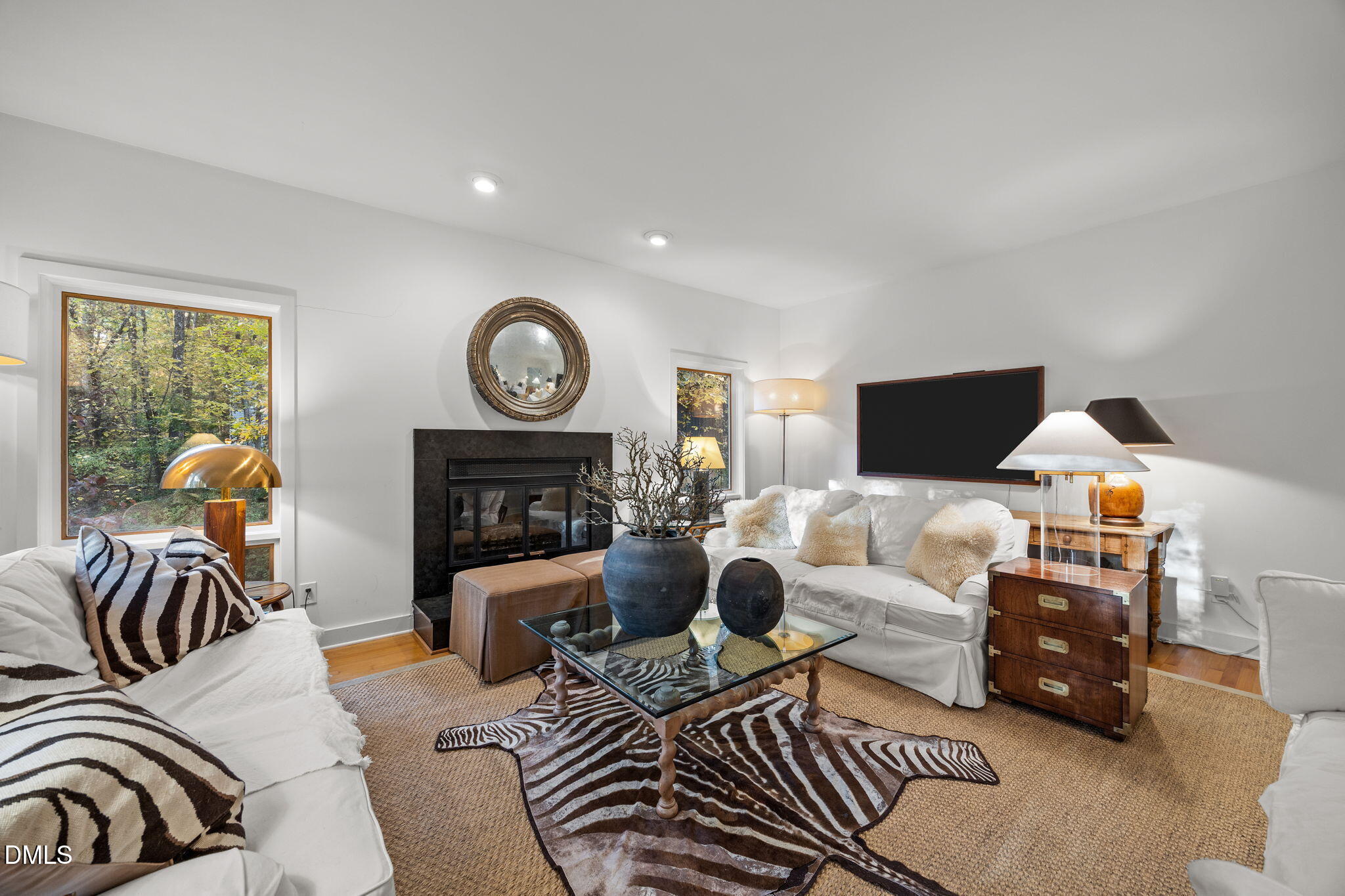 8 Womble Circle Durham, NC 27705 - Photo 15 of 49 a living room with furniture a fireplace and a flat screen tv