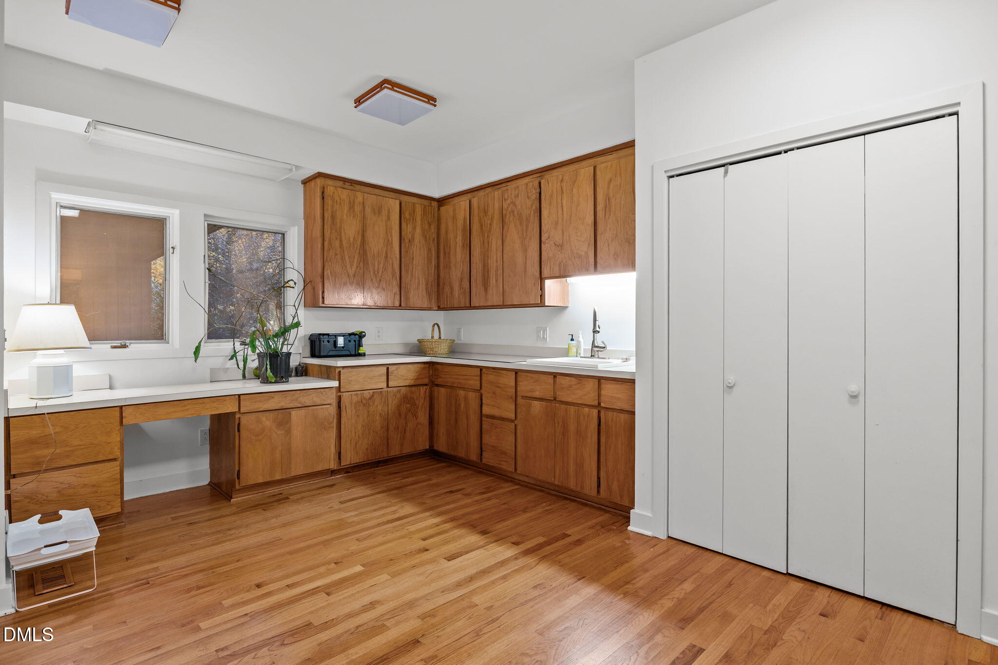 8 Womble Circle Durham, NC 27705 - Photo 18 of 49 a kitchen with granite countertop a sink cabinets stainless steel appliances and a window