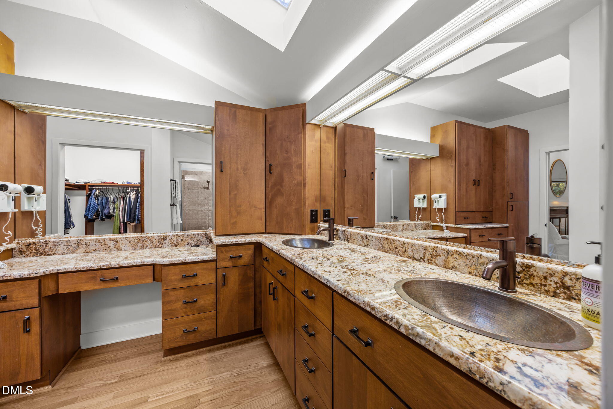 8 Womble Circle Durham, NC 27705 - Photo 27 of 49 a bathroom with a sink double vanity granite and a mirror