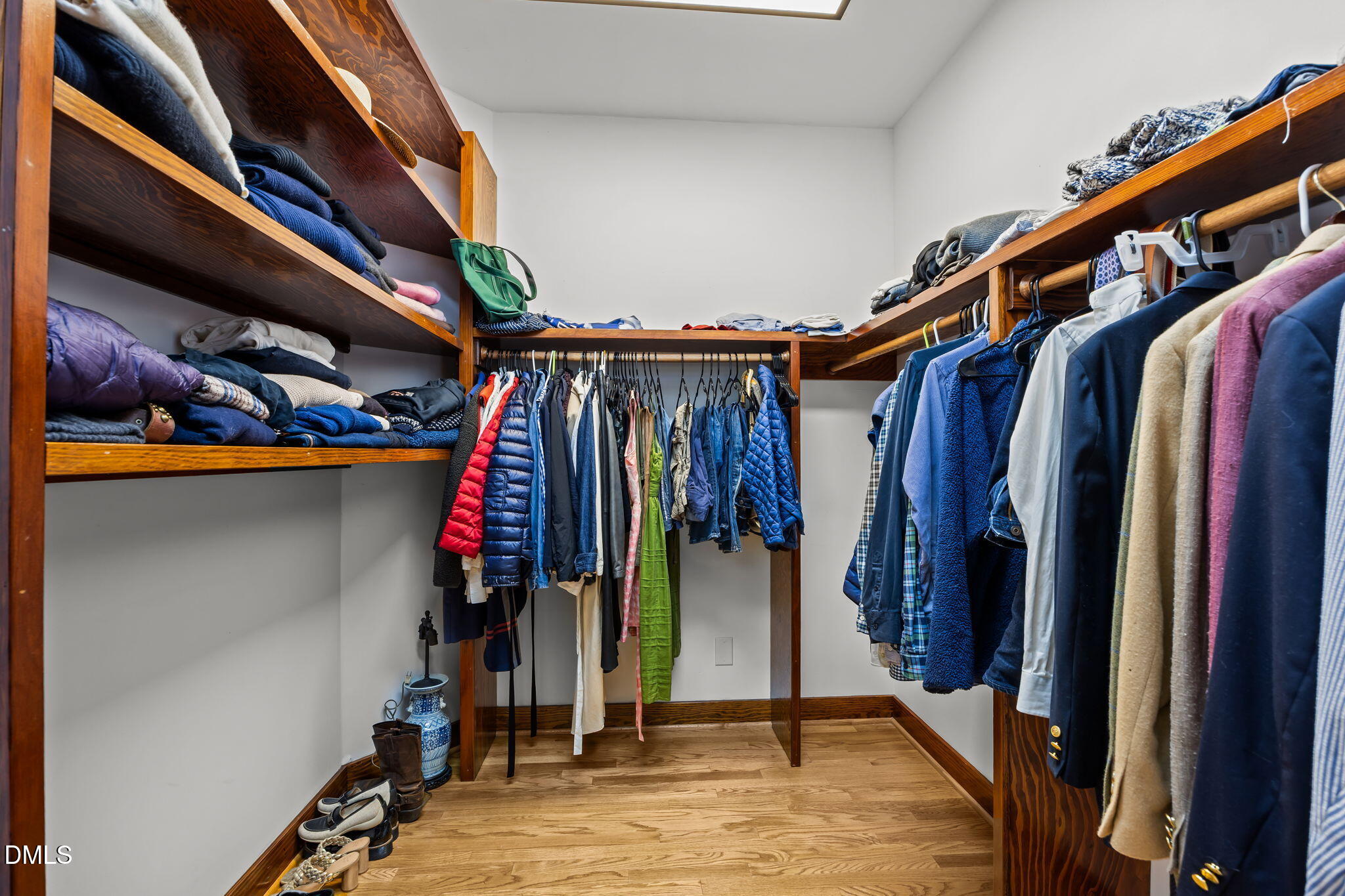 8 Womble Circle Durham, NC 27705 - Photo 29 of 49 a view of walk in closet with clothes and shoes
