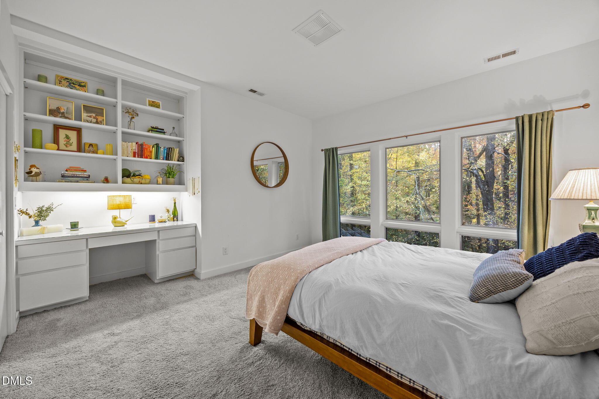 8 Womble Circle Durham, NC 27705 - Photo 31 of 49 a bedroom with a bed and a window