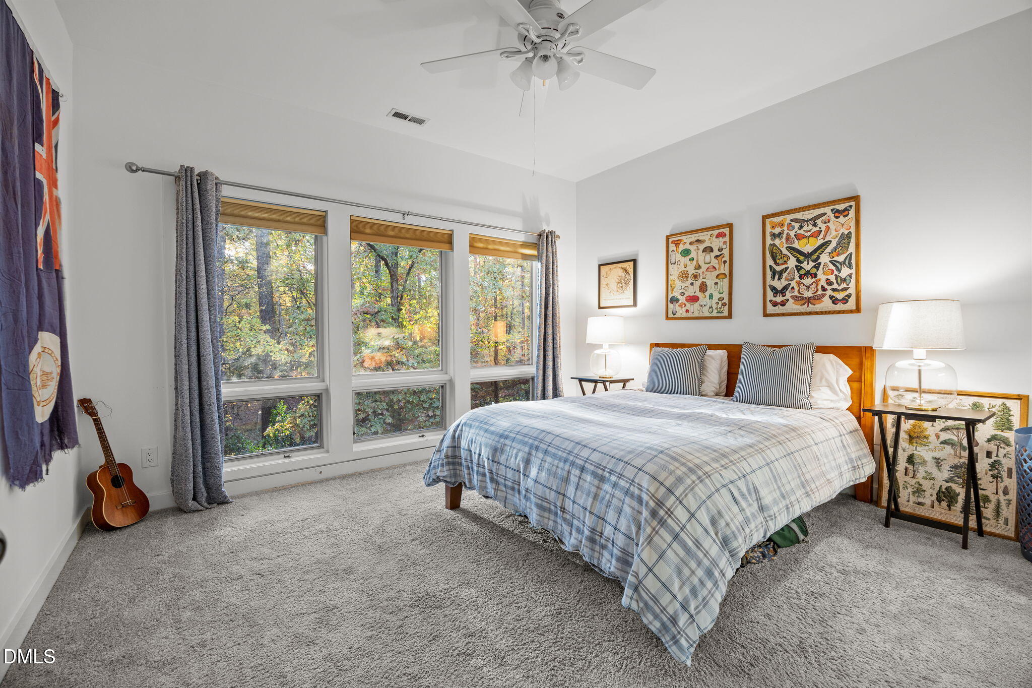 8 Womble Circle Durham, NC 27705 - Photo 33 of 49 a bedroom with a bed and a large window