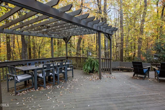 a view of a chairs and table in the patio