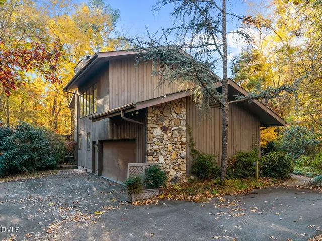 a view of outdoor space with wooden floor